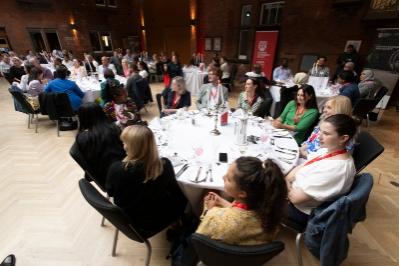 Full dinner table and guests